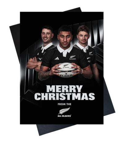 Christmas card with rugby players holding a ball, featuring 'Merry Christmas from the All Blacks'.