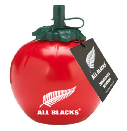 Red tomato-shaped container with green top, featuring 'All Blacks' logo, on a white background.