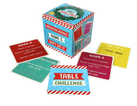 Card game box with various cards on a white background