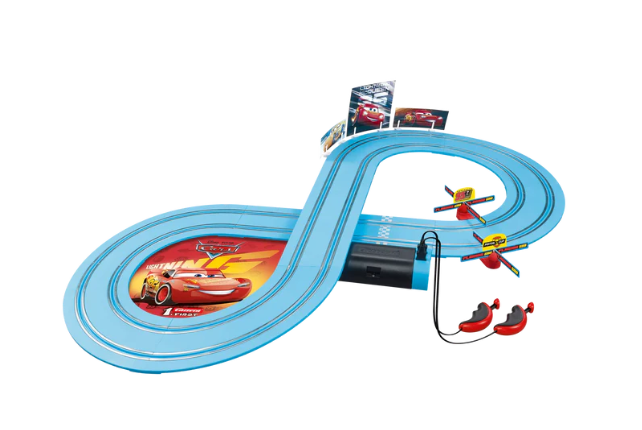 Toy race track set with cars on a white background