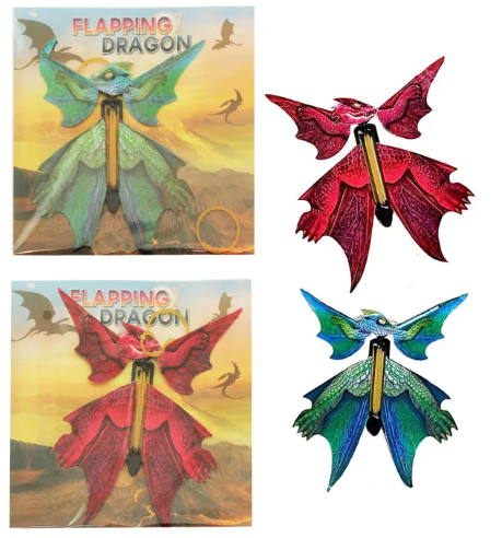 Colorful flapping dragon toys with packaging on a white background
