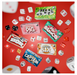 Collection of board game boxes and dice on a red background