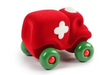 Red toy ambulance with green wheels on a white background