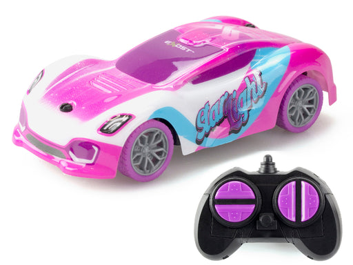 Pink and white toy car with remote control on a white background