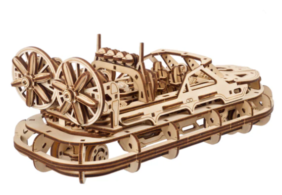 Wooden mechanical model on a white background