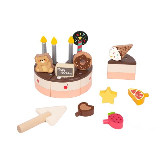 Toy birthday cake set with candles, slices, and accessories on a white background