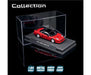 Red model car in a clear display case with 'Collection' branding.