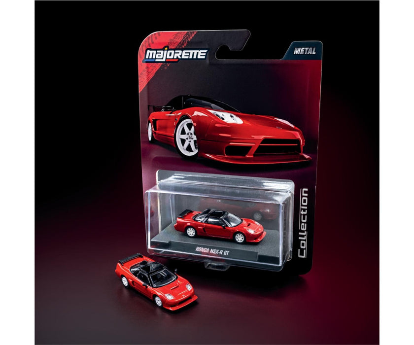 Red die-cast car model in packaging with Majorette branding on a dark background
